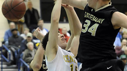 Gateway's Thomas Kromka blocks a shot by Central Catholic's Mike Anselmo.