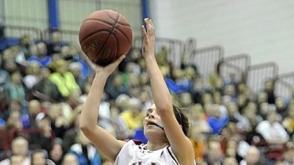 Oakland Catholic's Bobbi Baker gets off a shot gainst Mt. Lebanon in the WPIAL Class AAAA championship at the Palumbo Center Friday.