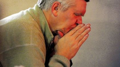 Mike Zielinski of Squirrel Hill listens while others sing during Tazie Prayer at East Liberty Presbyterian Church.  The Wednesday night service was begun in the Spring of 1992.  The service includes prayer, meditative singing and silence and is patterned after the international ecumenical prayer community in Taize, France.