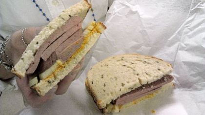 Eat local: a braunschweiger sandwich from the Post-Gazette lunchroom, gripped by Gretchen McKay.
