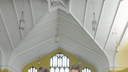 Matt Pritchard, left, and Matthew Case, both of South Homewood, look at the fourth station during the Open Door's seventh annual Stations of the Cross show in East Liberty on Friday.