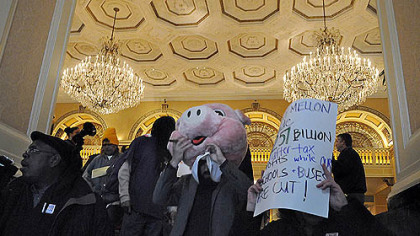 "One Pittsburgh" protesters leave  the Omni William Penn during BNY Mellon's shareholder meeting today.