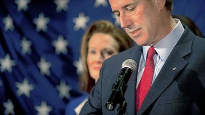 Former Pennsylvania Sen. Rick Santorum announces in Gettysburg, Pa., on Tuesday that he is suspending his candidacy for the presidency. His wife, Karen, stands behind him.