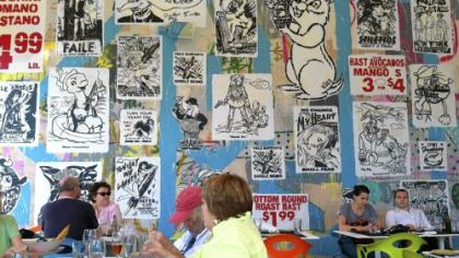 The patio wall at Wynwood Kitchen and Bar was painted by the American artist group Faile.