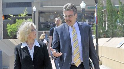 Lilly Ledbetter, whose name is on the Lilly Ledbetter Fair Pay Act that became federal law in 2009, talks with Duquesne University Law School Dean Ken Gormley as they walk across campus to the Power Center, where Ms. Ledbetter spoke Monday.