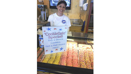 Bethel Bakery sales and marketing assistant Julie Lytle displays the store's Cookie Gate special.