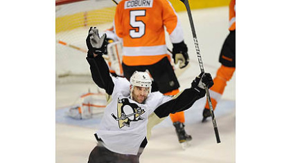 The Penguins' Pascal Dupuis celebrates his goal against the Flyers.