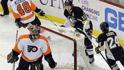Jordan Staal celebrates a goal on Flyers' Ilya Bryzgalov in the second period of game 5 at Consol Energy Center Friday night.