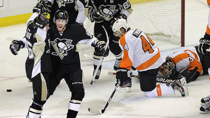 James Neal congratulates Steve Sullivann after scoring on Flyers' Ilya Bryzgalov in the first period at Consol Energy Center Friday night.