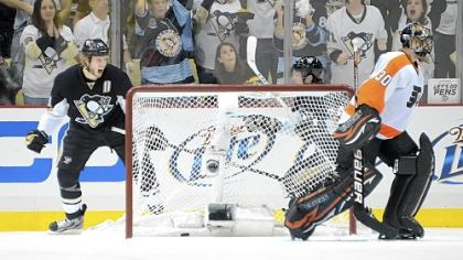 Penguins center Jordan Staal, left, celebrates his goal in front of Flyers goalie Ilya Bryzgalov in the second period Friday at Consol Energy Center.