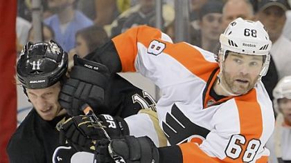 Penguins center Jordan Staal, left, takes a stick to the face from the Flyers' Jaromir Jagr in the third period of Game 5 Friday at Consol Energy Center.