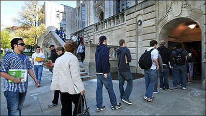 The line snakes out the door April 9 at the ground-floor entrance to the Cathedral of Learning along Bigelow Boulevard as increased security procedures took effect.