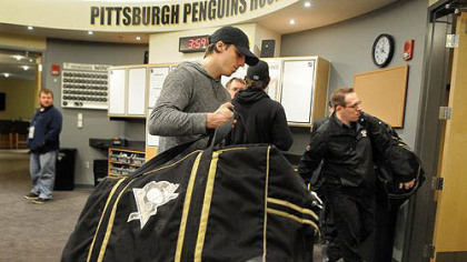 Penguins goalie Marc-Andre Fleury packs up his equipment in the Penguins locker room on Tuesday afternoon.