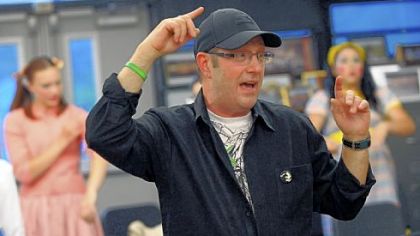 Director Larry Tempo offers well wishes before the show.