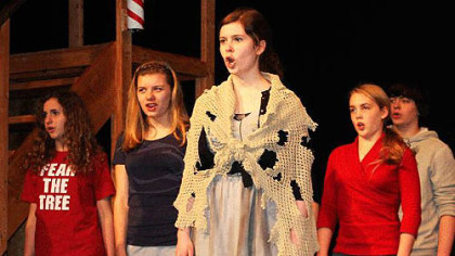 Avonworth High School's cast members rehearse a scene from "Sweeney Todd."