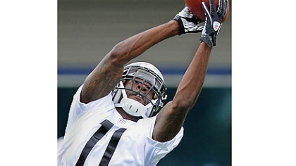 Toney Clemons goes up for a pass on Day 2 of rookie orientation camp.