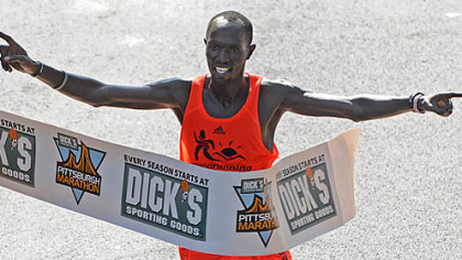 Claiming the gold cup in the men's division was James Kirwa of Kenya with a time of 2:14:09.