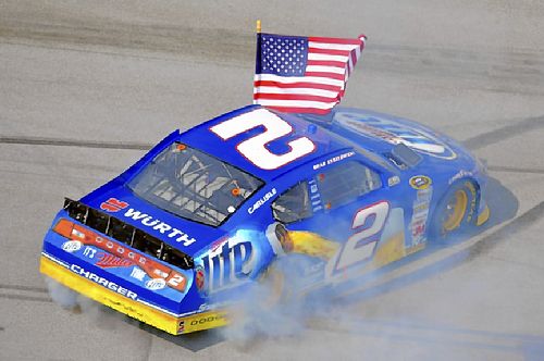 Brad Keselowski celebrates after winning the Sprint Cup race Sunday in 