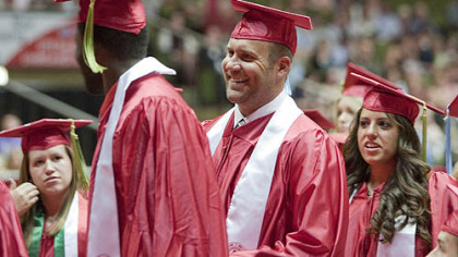 Ben Roethlisberger smiles before receiving his diploma from Miami University Sunday in Oxford, Ohio. Roethlisberger graduated with a bachelor's degree in education 11 years after enrolling.