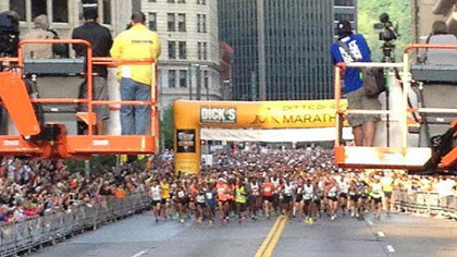 The runners at the Pittsburgh Marathon get moving as the race begins.