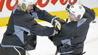 Jordan Staal, jostling with teammate Sidney Crosby during a practice session Tuesday in Montreal, appears to be ready to return to the lineup after missing the past 15 games with a knee injury.