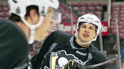 Sidney Crosby skated with his teammates for the first time in more than a month Friday but still has no idea when he'll be cleared to practice, let alone see action in a game.