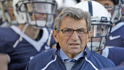 Former Penn State coach Joe Paterno died today at age 85. In this Nov. 7, 2009, file photo, he  stands with his players before taking the field for a game against Ohio State at Beaver Stadium.