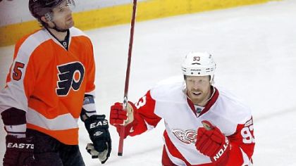 Red Wings right wing Johan Franzen celebrates his goal against the Flyers Sunday in Detroit. The Red Wings won, 4-3.