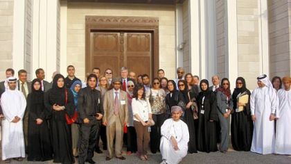 University of Pittsburgh professor Ronald Brand, back center, and Pitt students join students from seven Middle-Eastern universities at Sultan Qaboos University in Oman last month.