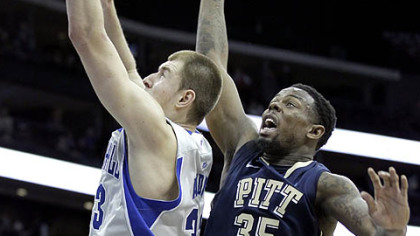 Seton Hall's Patrik Auda, left, goes up for a shot against Pitt's Nasir Robinson during the first half in Newark, N.J.