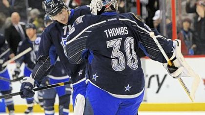 Team Chara's Evgeni Malkin and goaltender Tim Thomas celebrate their 12-9 victory Sunday against Team Alfredsson in the NHL All-Star Game in Ottawa, Ontario. Will Malkin finish the second half of the season as the league leader in points for his second Art Ross trophy?