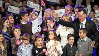 Republican presidential candidate Mitt Romney with his wife, Ann, (in white), children and grandchildren on primary night last week in New Hampshire. The Romneys have five sons and 16 grandchildren.