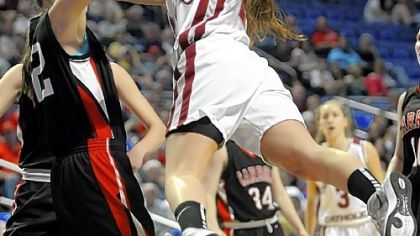 Oakland Catholic's Rachel Vigliotti drives to the basket against Archbishop Carroll in the PIAA Class AAAA girls championship game at Penn State's Bryce Jordan Center this past Friday.