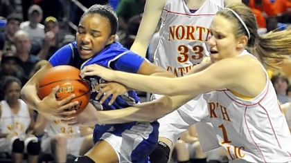 Steelton-Highspire's Jazmine Blanding, left, grabs a rebound against North Catholic's Angela Nowacki in the PIAA Class A championship game.