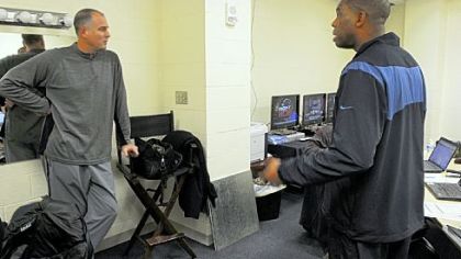 Bilas, left, and Hubert Davis confer in the production room in anticipation of the next day's telecast.
