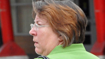 Patricia K. Smith leaves the Federal Courthouse in Downtown after being sentenced to 6 1/2 years in prison for embezzling $10.3 million from the Baierl Accura car dealership, where she served as controller.