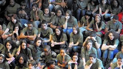 Pittsburgh CAPA students listen to speakers Friday during an assembly about teen dating violence hosted by the Ladies Hospital Aid Society in the school's Black Box Theater.