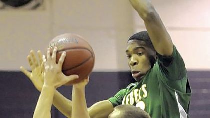 Bishop Canevin's Eric Theobold drives to the basket Friday against Seton-LaSalle's Dale Clancy.