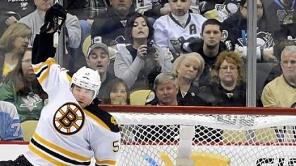 Boston's Johnny Boychuk is called for goaltender interference on the Penguins' Marc-Andre Fleury in the third period Sunday at Consol Energy Center. Fleury earned his 37th win of the season.