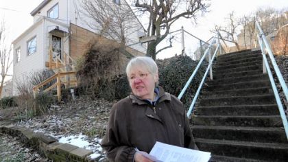 Marilyn Pavlik recites a litany of increased assessments in a two-block length of dead-end Mary Street on Pittsburgh's South Side. The assessment on Ms. Pavlik's home went from $53,300 to $169,900.