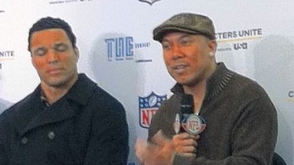 Steelers receiver Hines Ward, seated next to Atlanta tight end Tony Gonzalez, speaks about his role in mentoring a Clairton High School student at a news conference Thursday at the J.W. Marriott in Indianapolis.