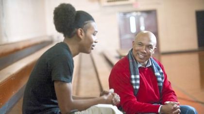 Carlton Dennis interviews Hines Ward at Clairton High School for USA Network's "NFL Characters Unite."