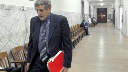 Common Pleas Senior Judge R. Stanton Wettick Jr. walks to the courtroom in the City-County Building, Downtown Tuesday to conduct a hearing on the ongoing reassessment process for Pittsburgh and Mount Oliver properties. Judge Wettick ordered the county manager, chief assessment officer and other top officials below Allegheny County Executive Rich Fitzgerald in the chain of command to follow the judge's orders to proceed with the reassessment.