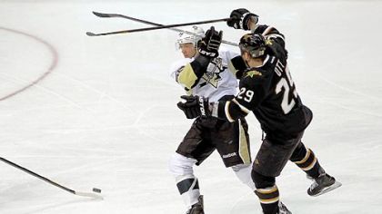 Kris Letang tangles Wednesday with Dallas' Steve Ott. Letang is suffering from concussion symptoms after a hit from forward Eric Nystrom later in the game.