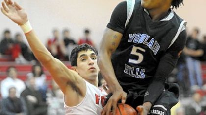 Woodland Hills' Shakim Alonzo leads the Wolverines with 22.4 points per game.