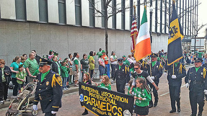 Crowds lined Downtown streets this morning for the annual St. Patrick's Day Parade.