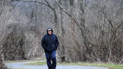 David Pauloski of Cranberry walks Tuesday on the Marconi Trail, part of the trail network in Marshall.