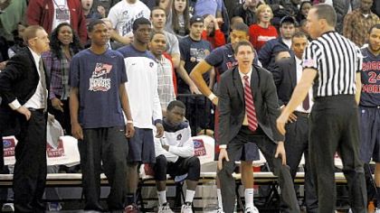 Robert Morris coach Andy Toole looks to the referee after no foul was called on a hit that landed Lucky Jones on the floor Wednesday night against Long Island in Brooklyn.