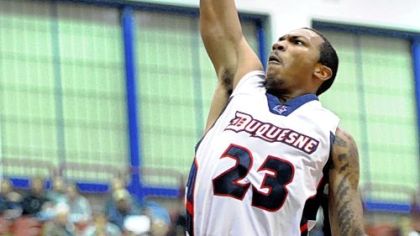 Duquesne's B.J. Monteiro soars in for two of his game-high 23 points Wednesday at Palumbo Center in the Dukes' Atlantic 10 win against Massachusetts.