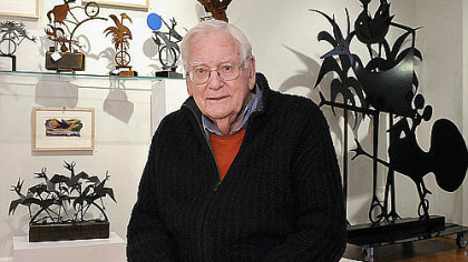 David Lewis with his work at the Mendelson Gallery.